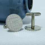 Manchetknopen gemaakt van 25 cent, kwartje 1985