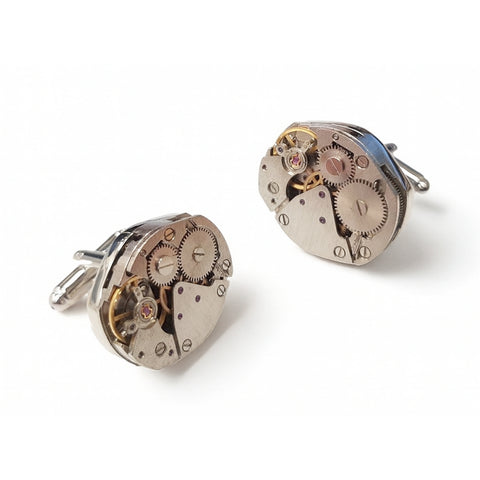 Ovale manchetknopen met zichtbaar horlogemechaniek