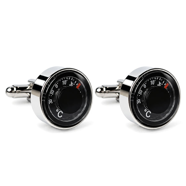 Twee ronde manchetknopen met zwarte temperatuurmeterschaal, witte cijfers, rood accent en glanzende zilverkleurige rand.