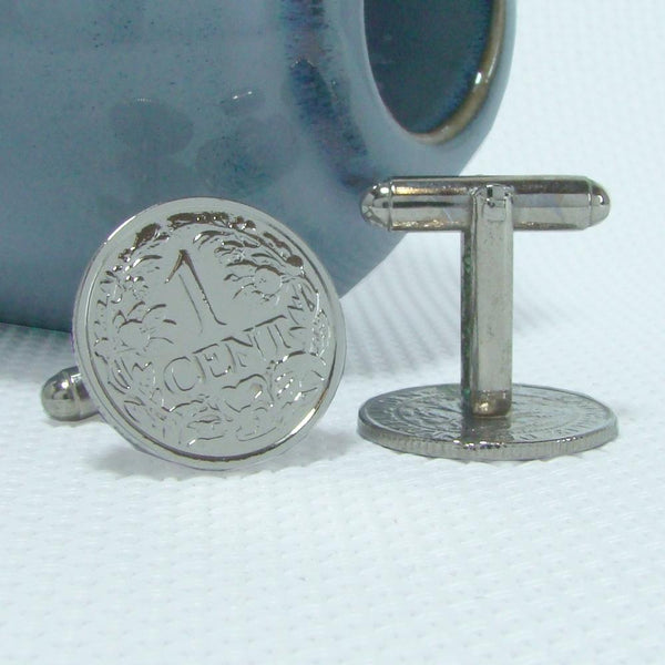 Manchetknopen gemaakt van 1 cent 1937