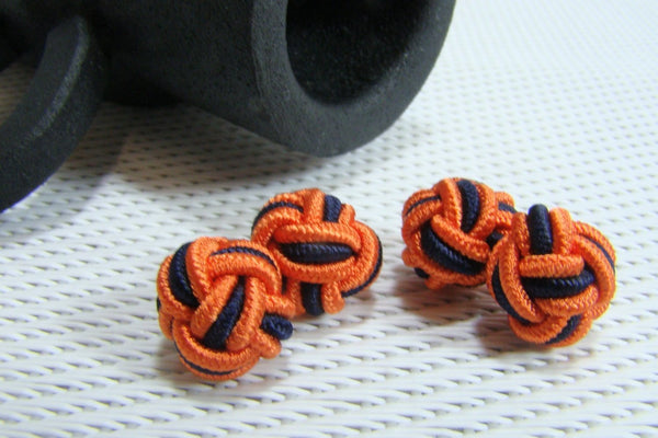Manchetknopen Donkerblauw met oranje Gevlochten