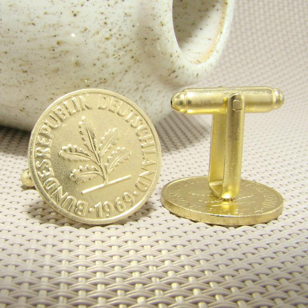 Manchetknopen Duitsland gemaakt van 2 Pfennig 1969