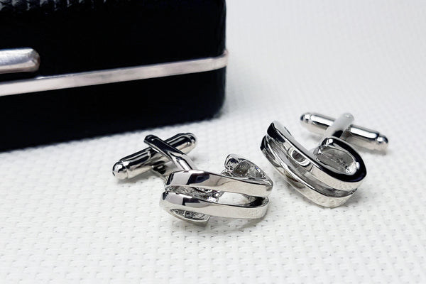 Manchetknopen Zilverkleurige bogen