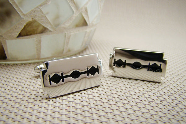 Manchetknopen Scheermes