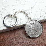 Zilveren sleutelhanger met Nederlandse Gulden 2000